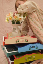 Stack of painted trays